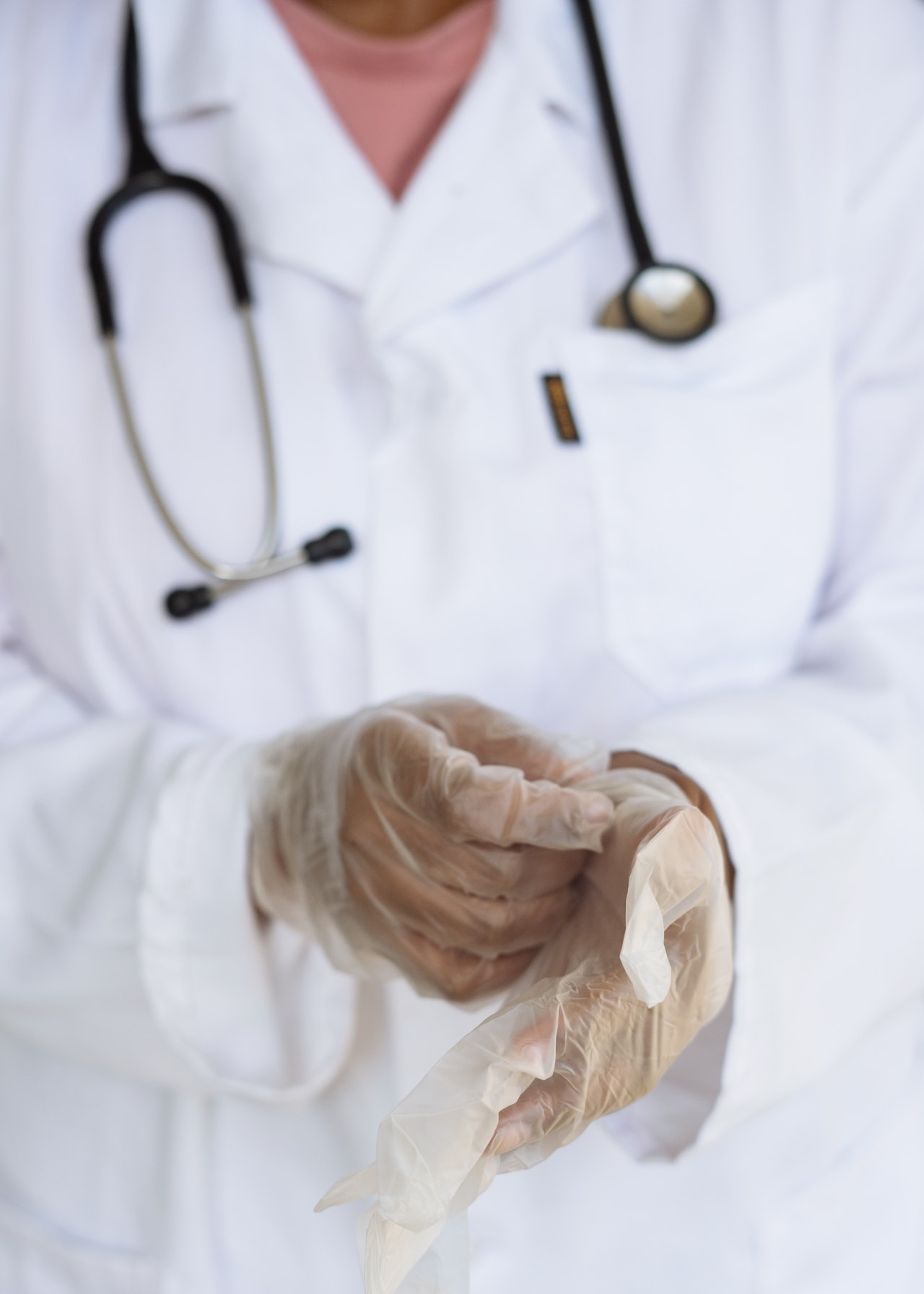 doctor wearing hand gloves