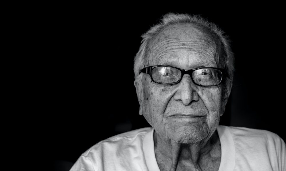 elder man wearing glasses