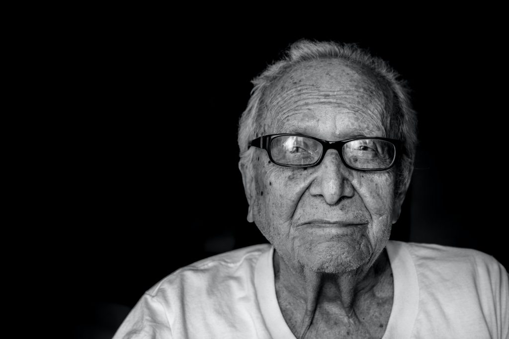 elder man wearing glasses