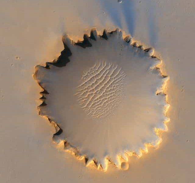 Sand blown by ripples