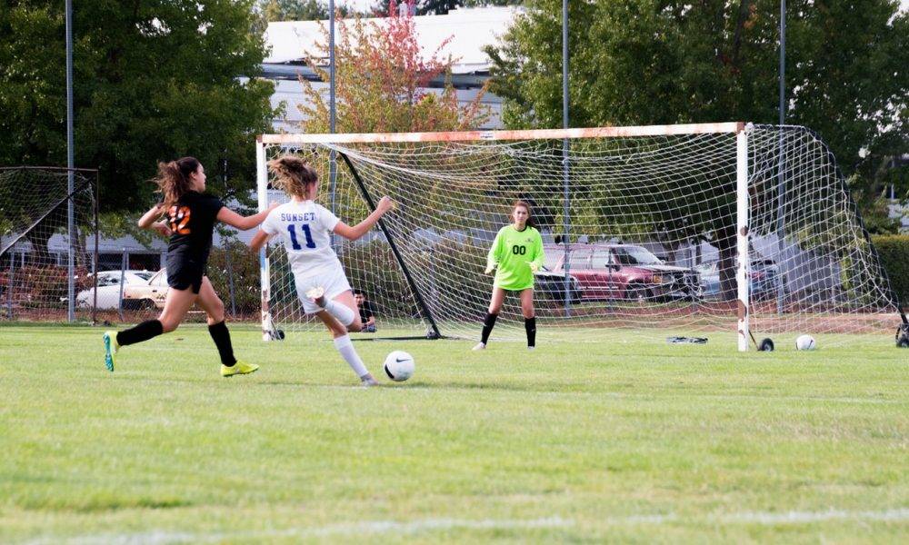 girls playing football