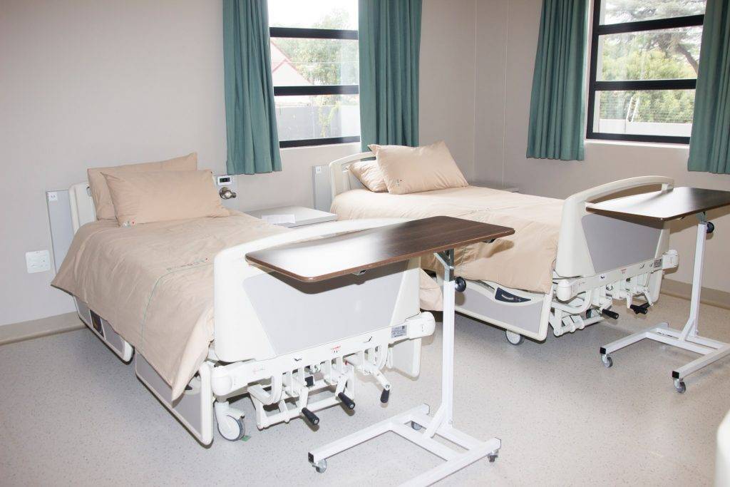 hospital room with two empty beds