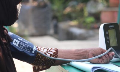 Person's blood pressure being taken
