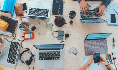 people using laptop and phone