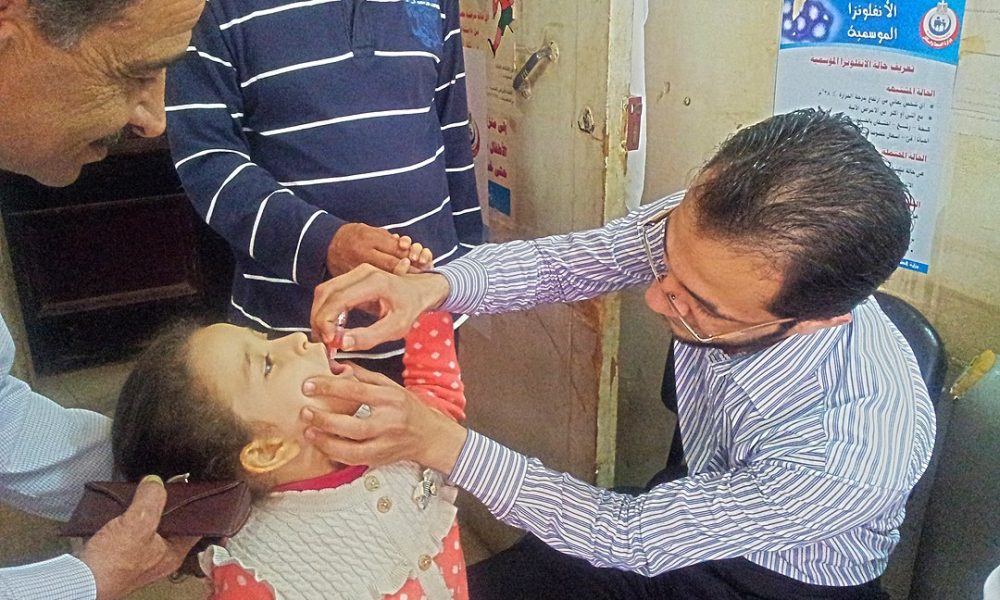 Child receiving the polio vaccine.