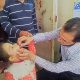 Child receiving the polio vaccine.