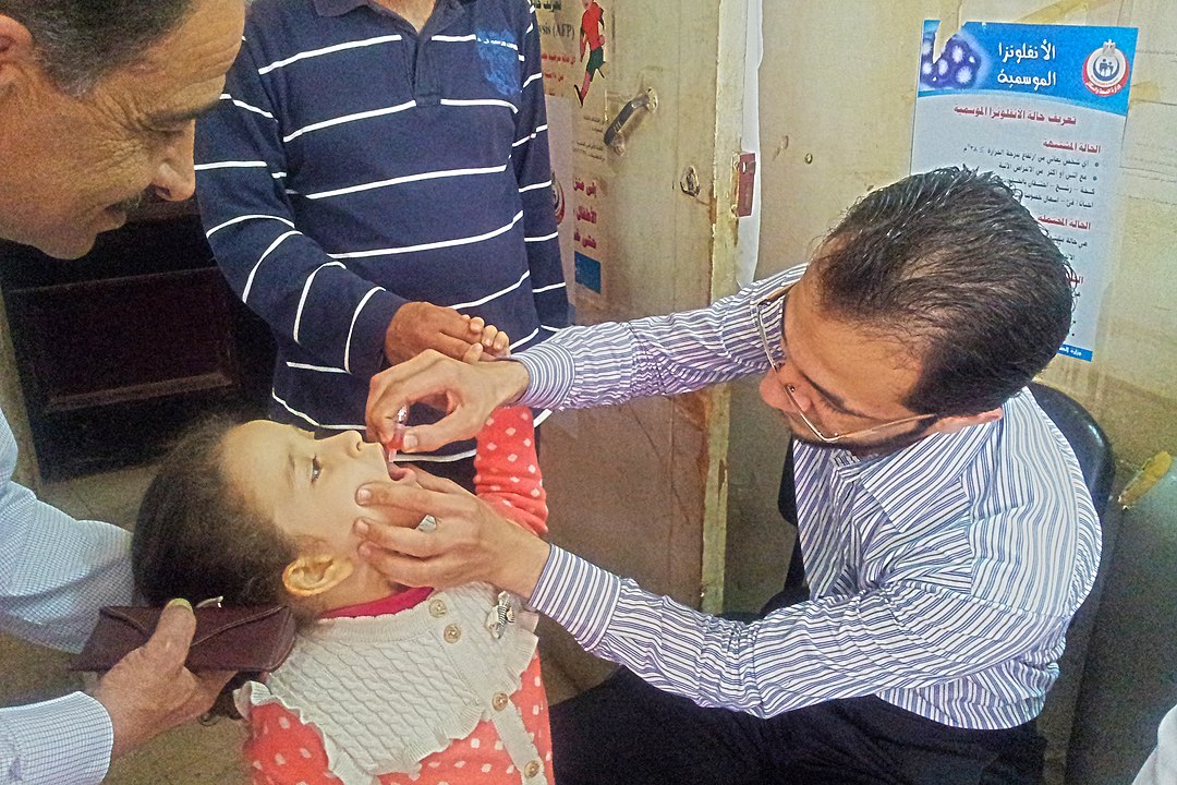 Child receiving the polio vaccine.