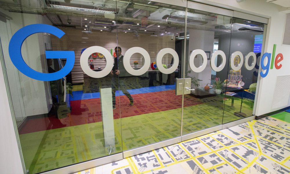 Google office with the glass decorated with the word Gooooooogle
