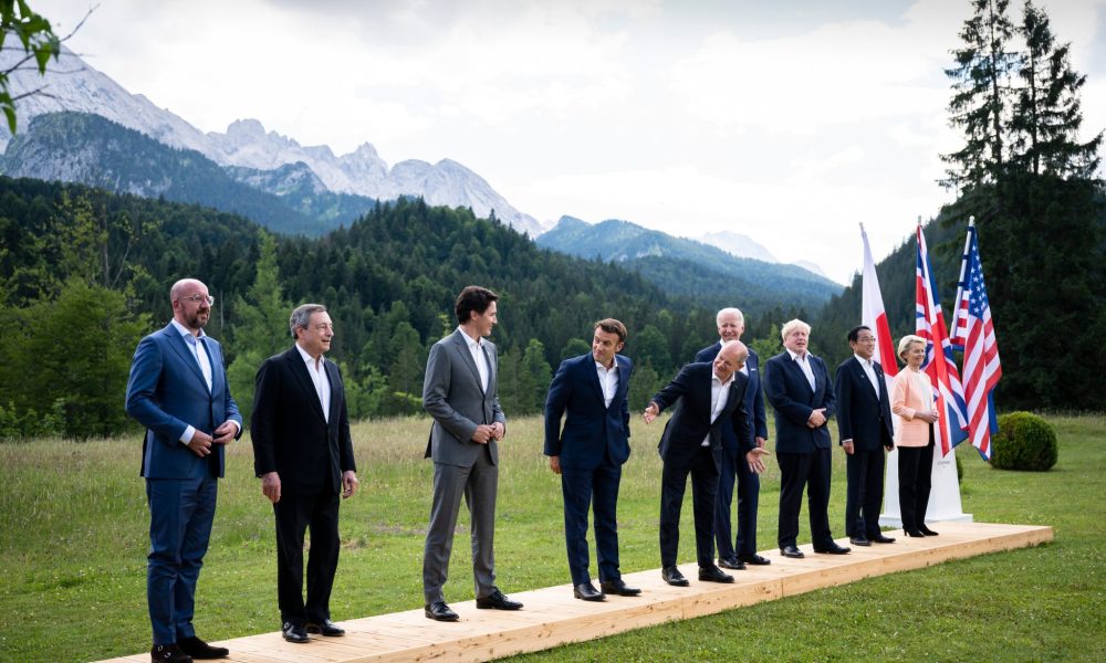 leaders wearing suits in a line
