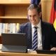 Jim Chalmers smiling on his tablet screen