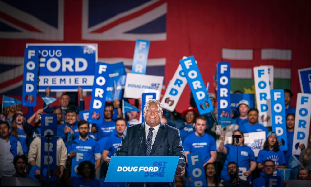 Ford with his supporters behind him