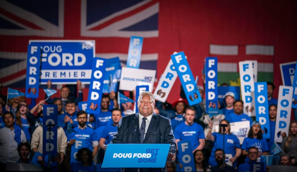 Ford with his supporters behind him