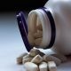 open bottle of pills