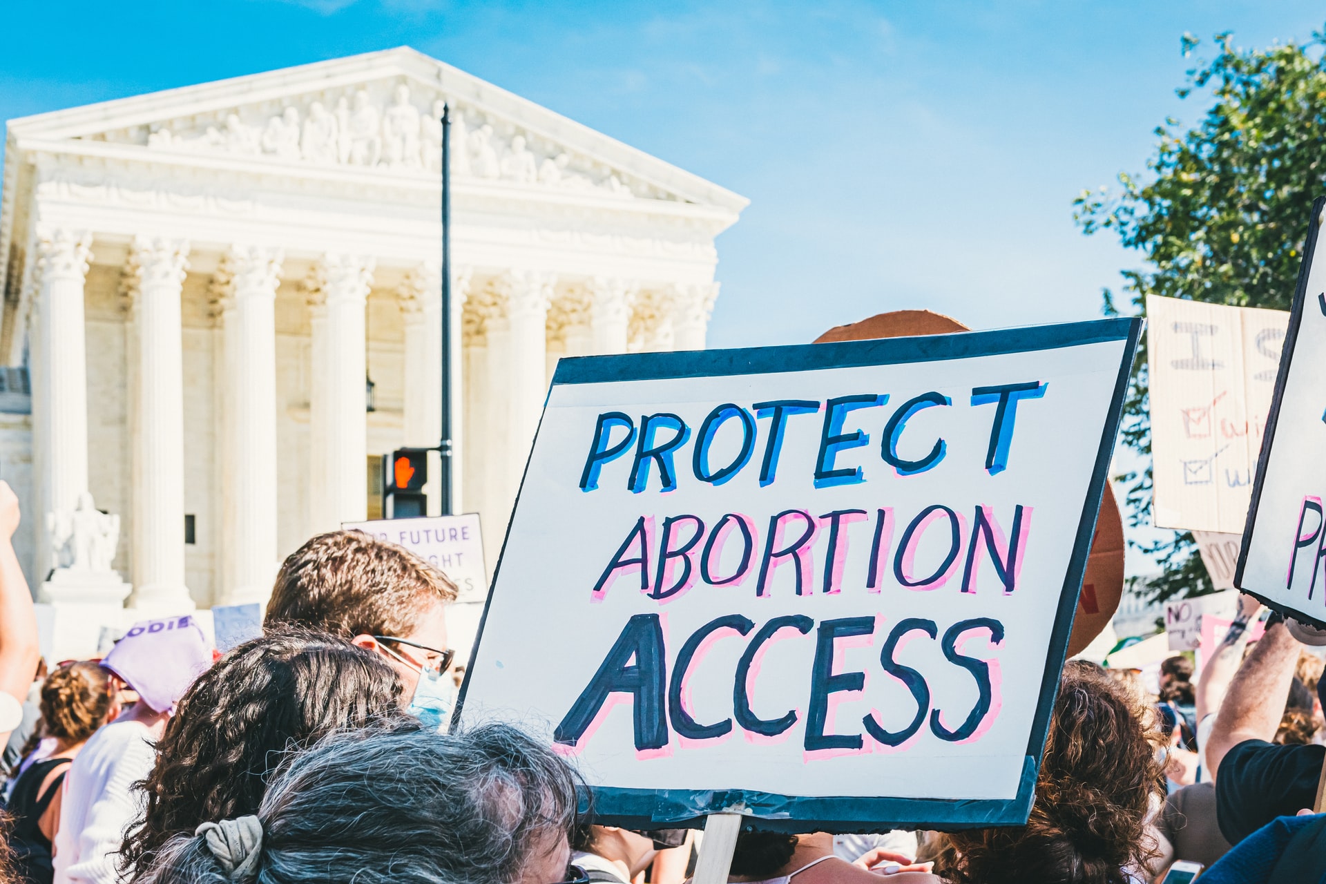 protect abortion access placcard