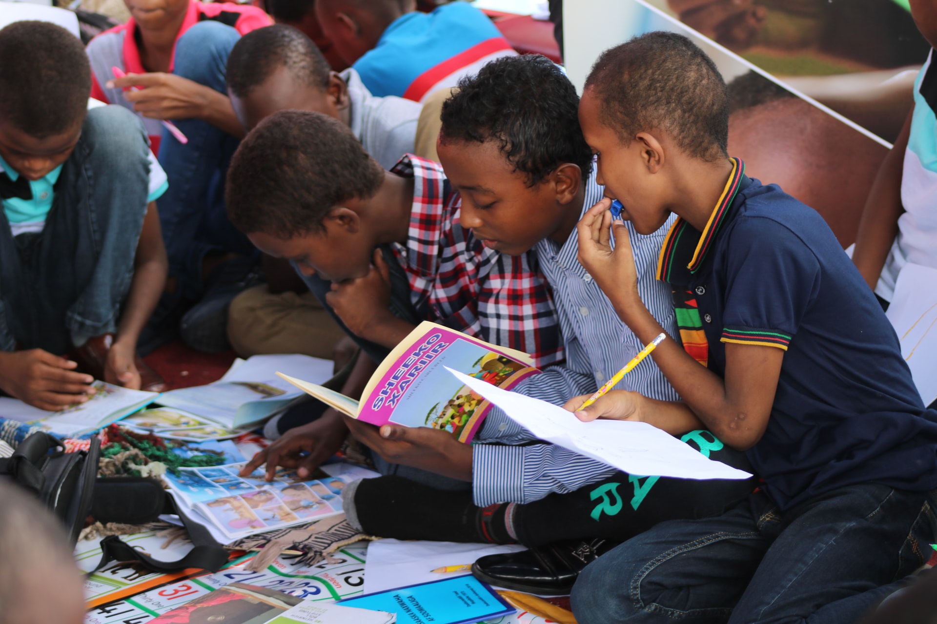 Students with books and pencils