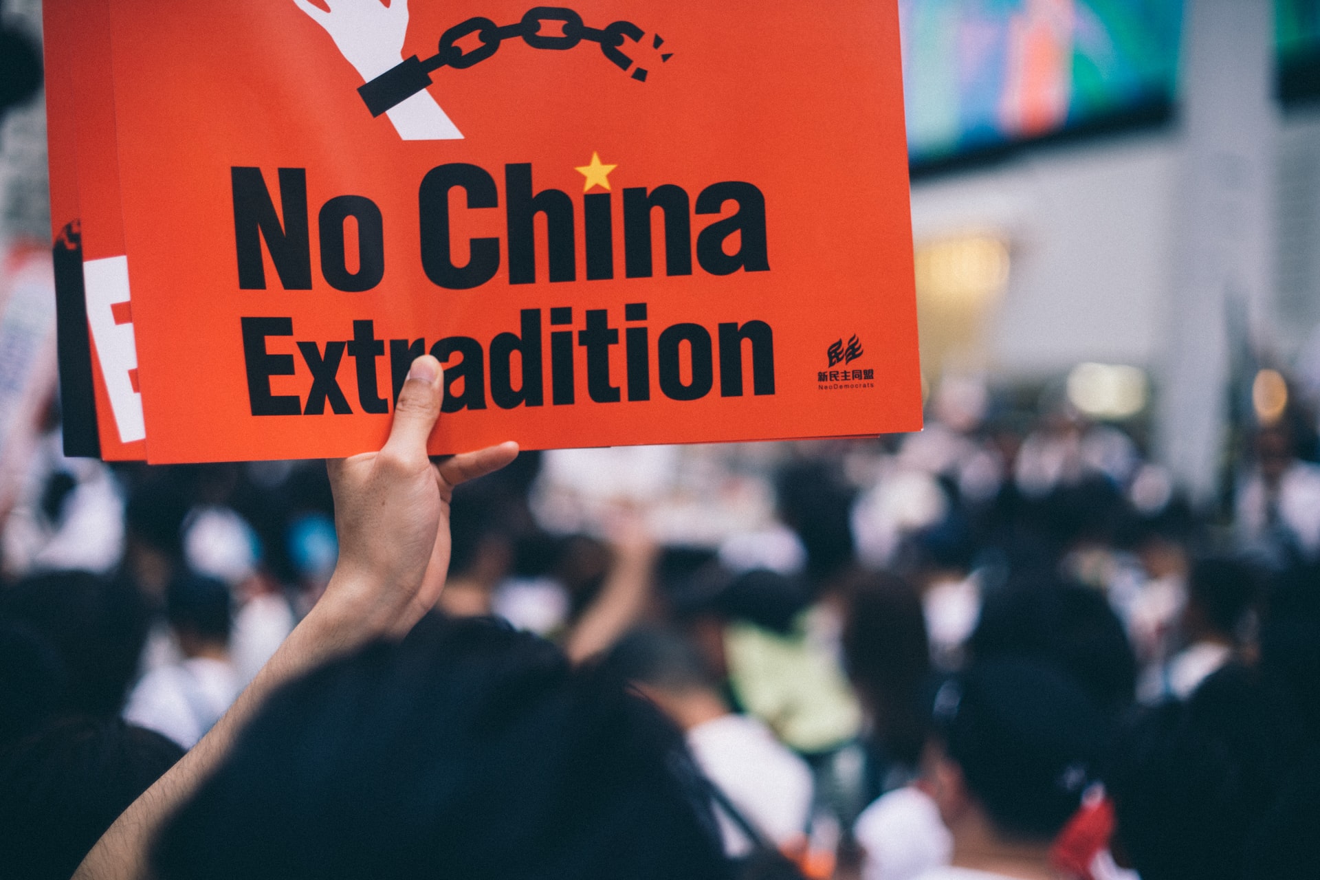 Red placard read as "No China extradition"