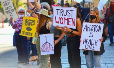 women holding pro-abortion signs