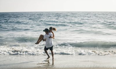 couple playing on the beach