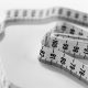A tape measure on a white surface