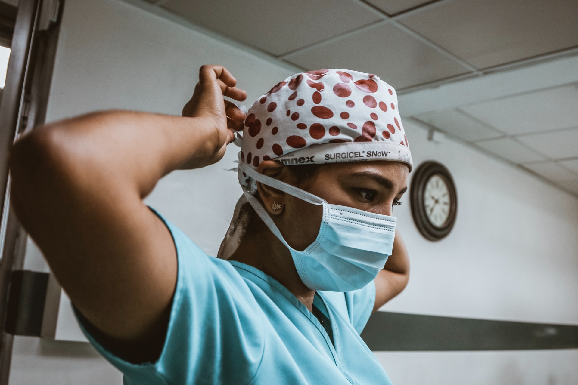 doctor in scrub suit and face mask