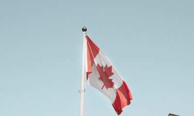 Canada flag raised on pole