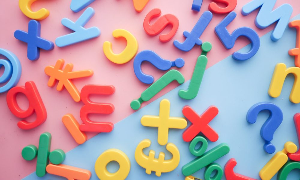 Colorful and jumbled letters, numbers, and symbols