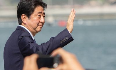 Abe waving his hand