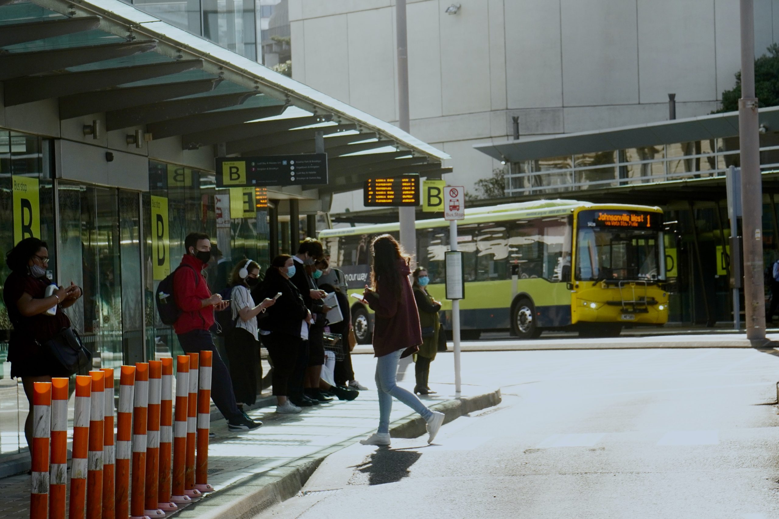 People waiting for the bus at the Wellington Central bus hub