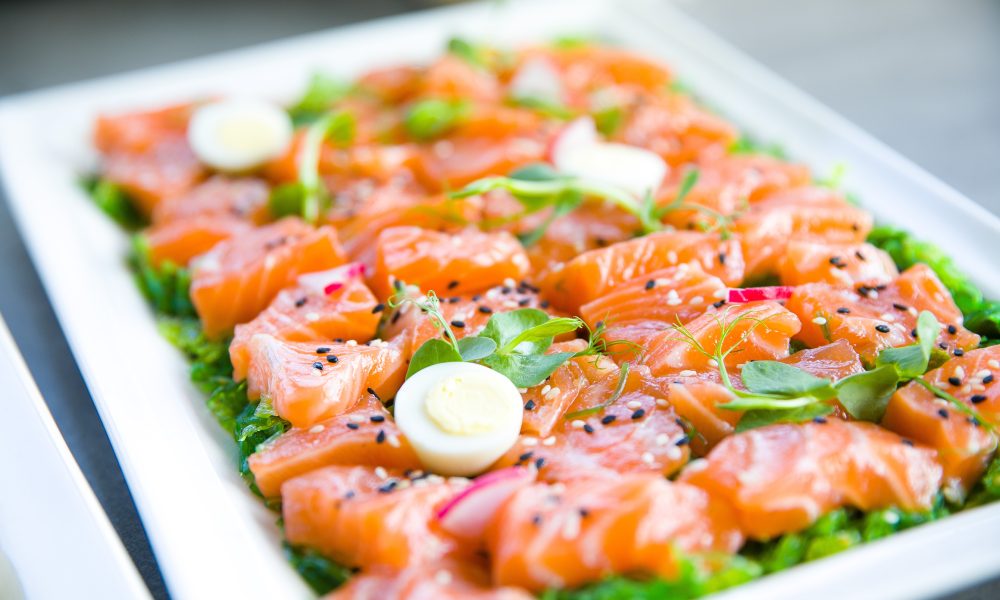Salmon with greens and quail eggs