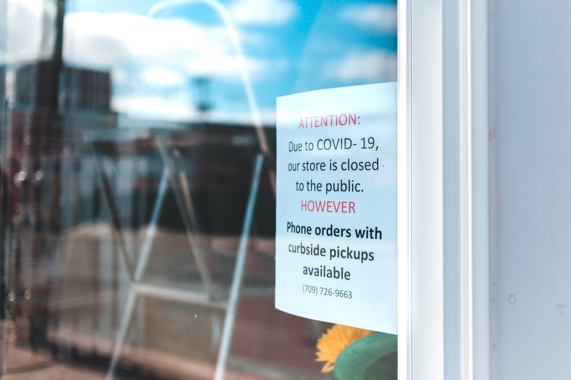 store announcement on glass wall