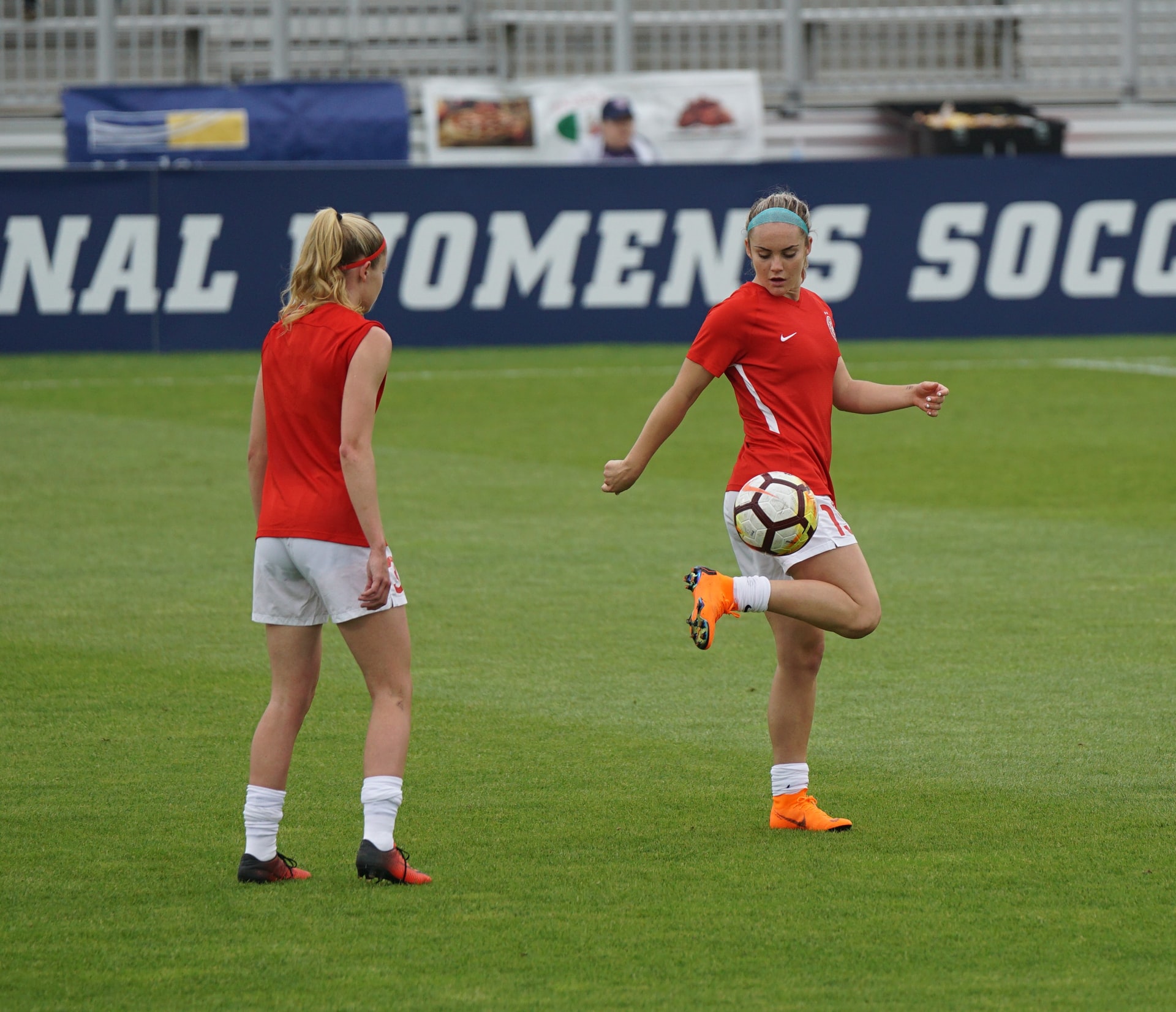 women playing football