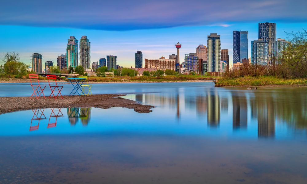 Panoramic long exposure of the Bow river and downtown Calgary in the summer.