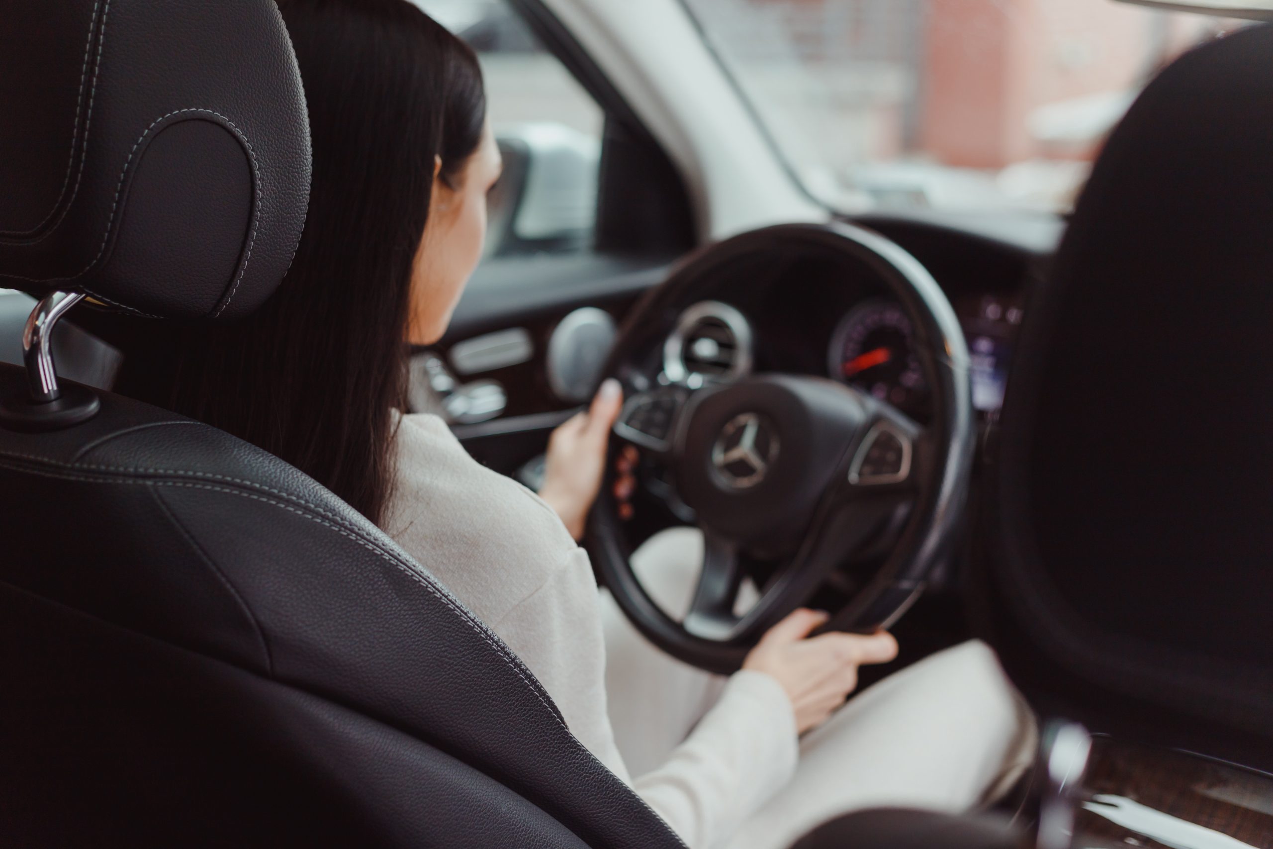 Woman Driving a Car