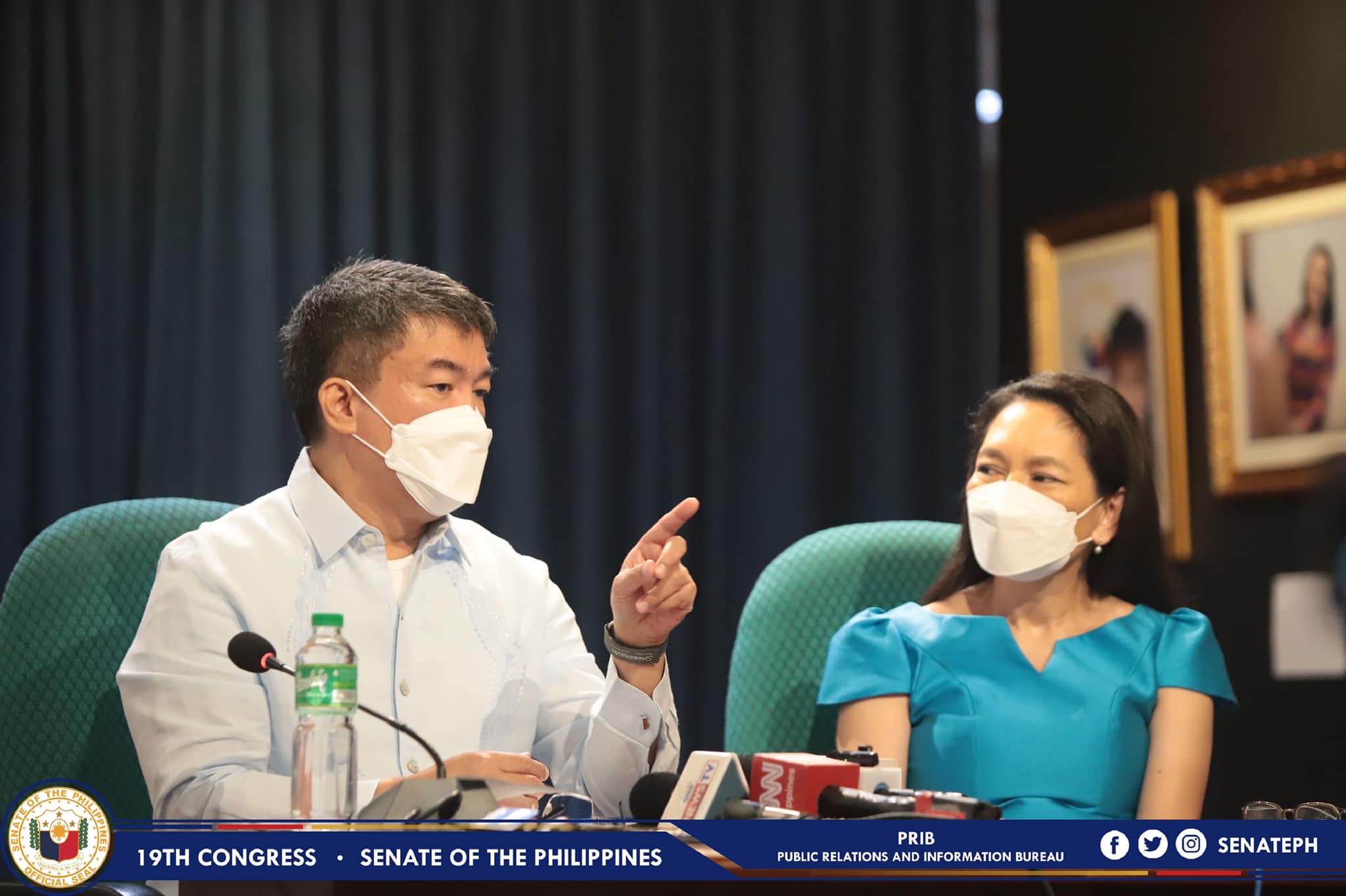 Sen. Aquilino Pimentel III and Sen. Risa Hontiveros talking