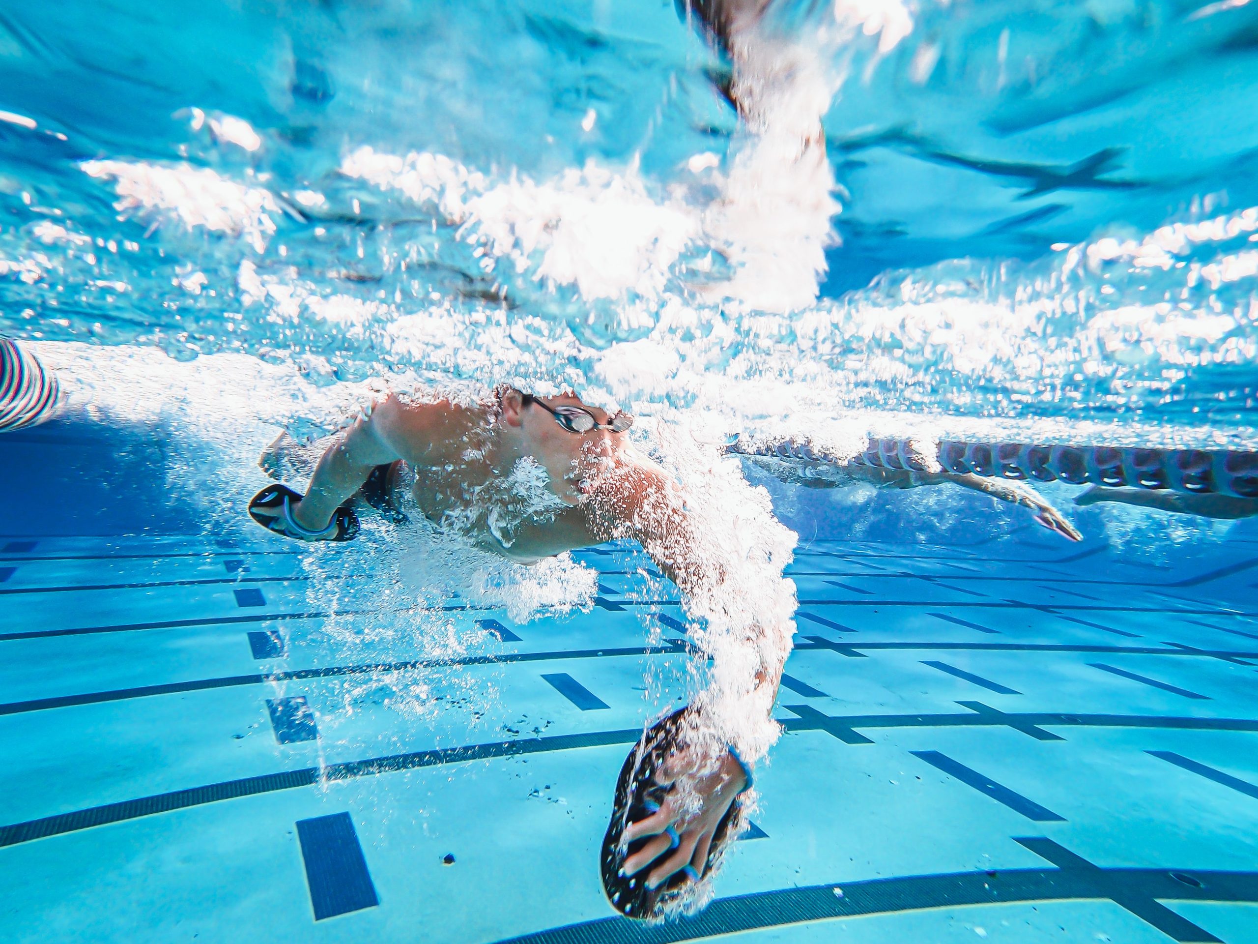 A Person Swimming in the Pool