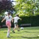 Kids Playing Football on the Field