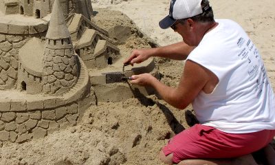 Man building sandcastle