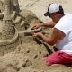 Man building sandcastle