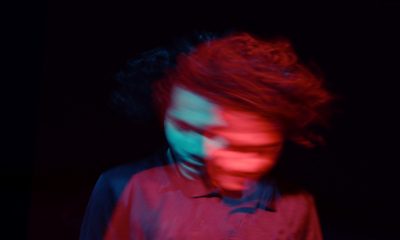 Man swinging his head