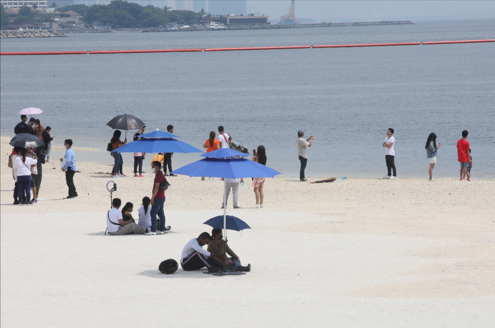 People visiting Manila Bay