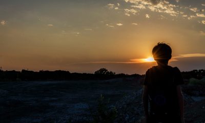 Silhouette of a Boy During Sunset