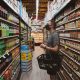 man looking at grocery