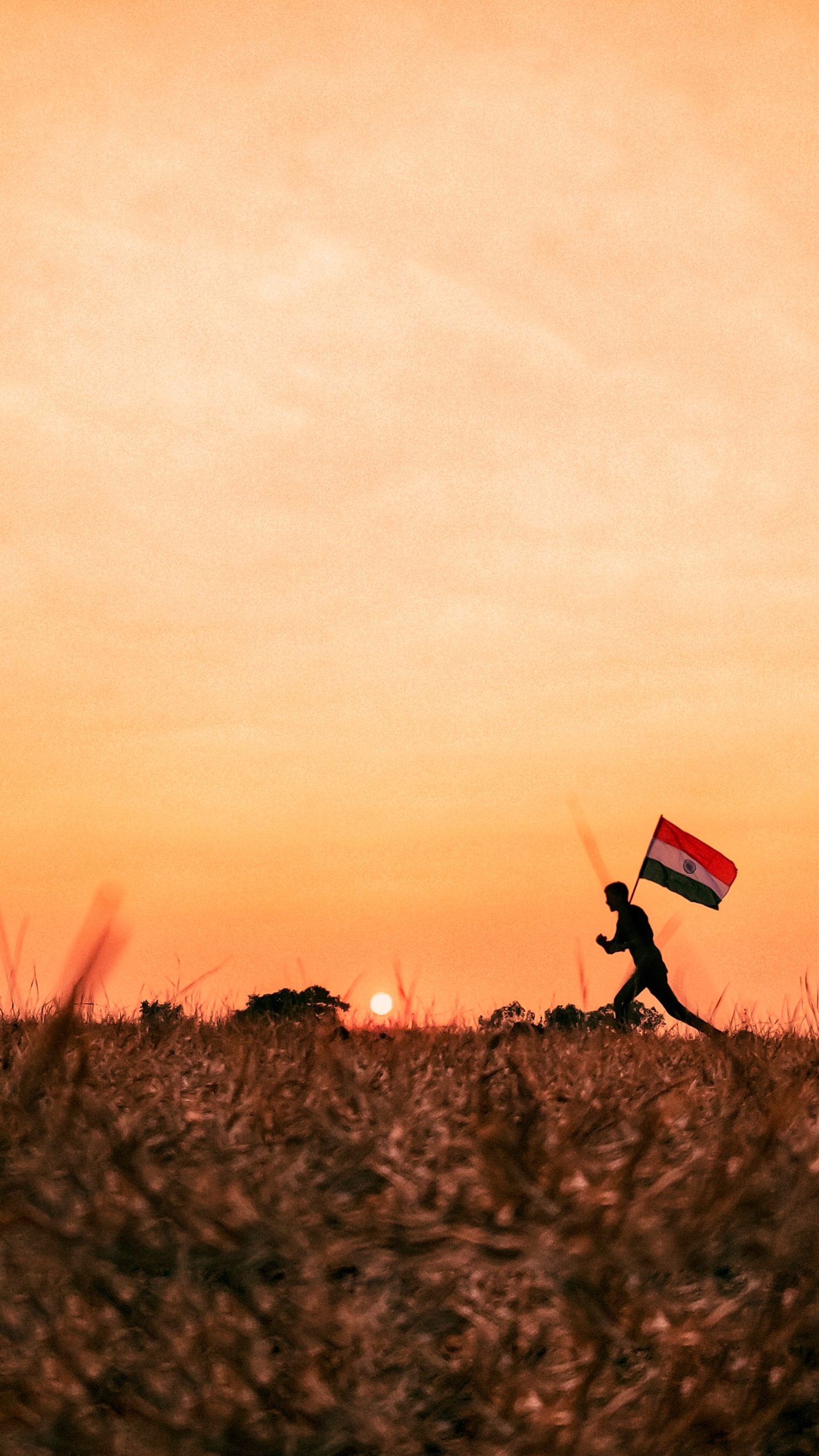 man running with India flag