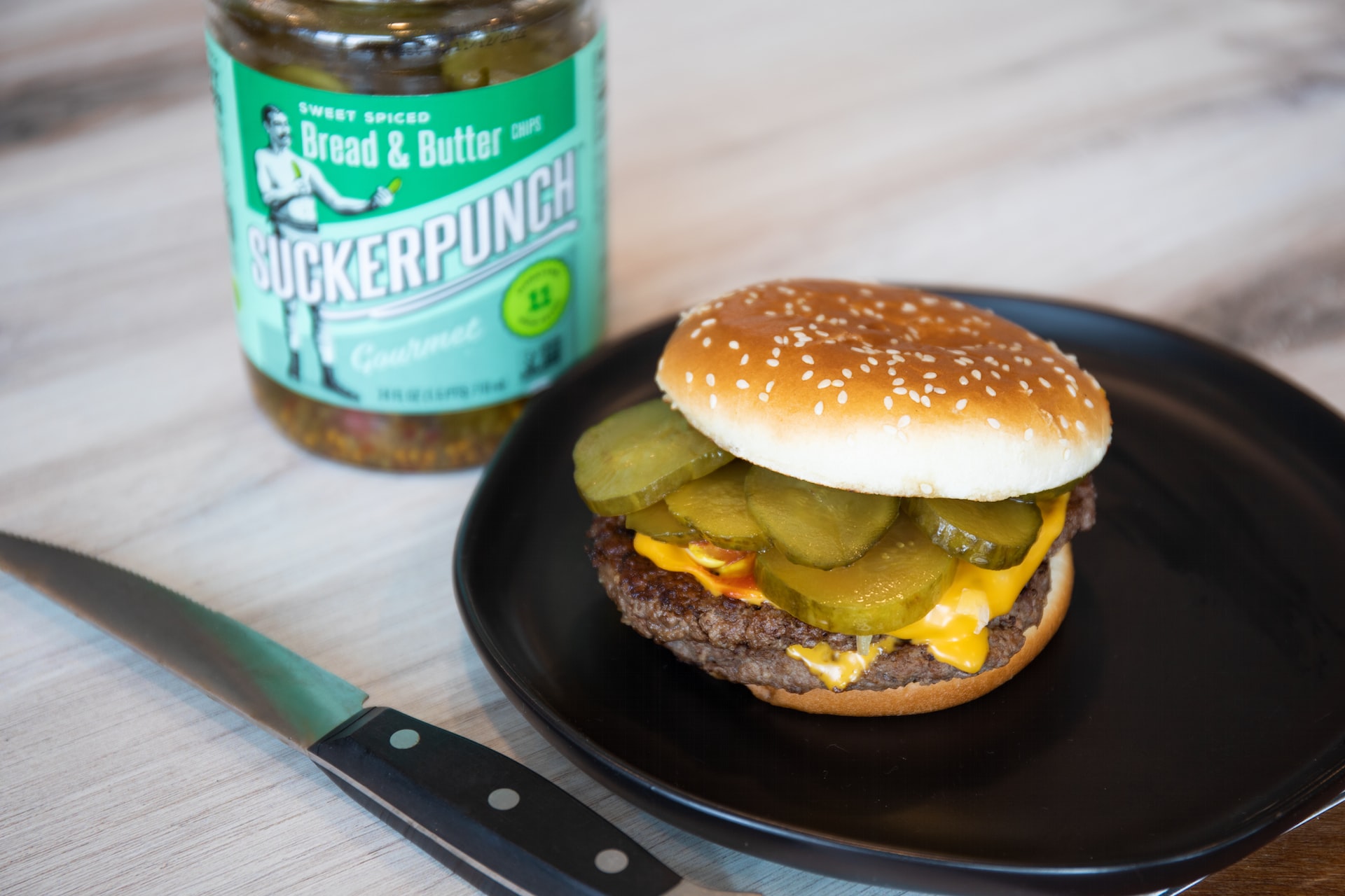 burger filled with pickles inside