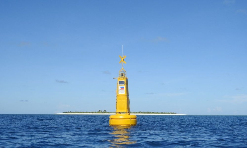 A navigational buoy with a Philippine flag in the West Philippine Sea