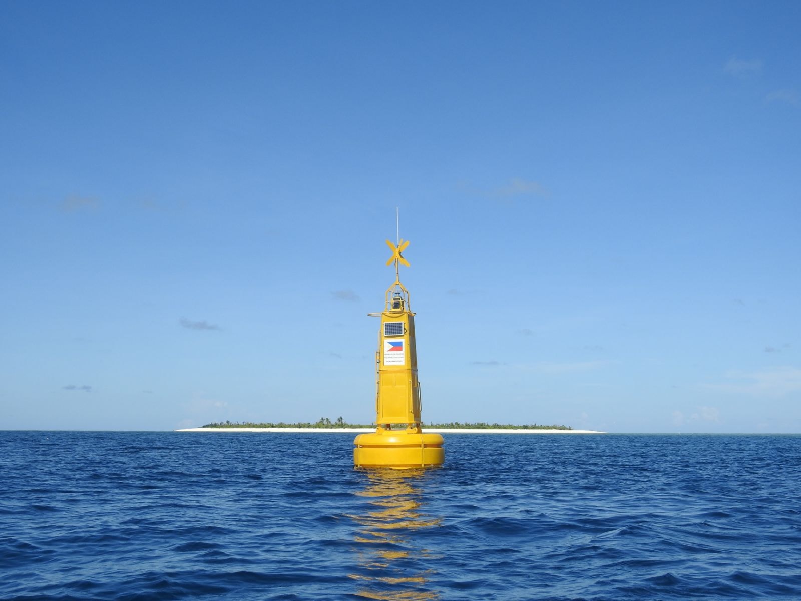A navigational buoy with a Philippine flag in the West Philippine Sea