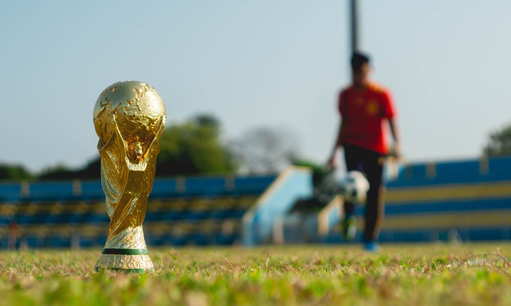 Gold trophy on grass field