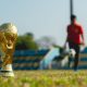 Gold trophy on grass field