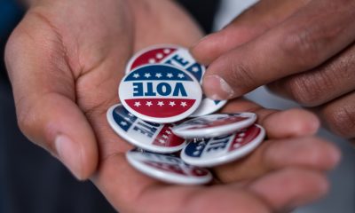 Hands With Vote Pins