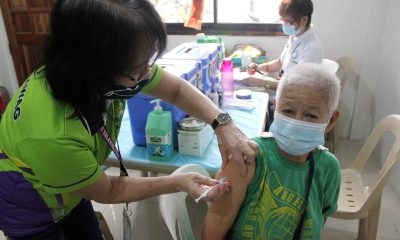 Injecting COVID-19 vaccine booster to an elderly